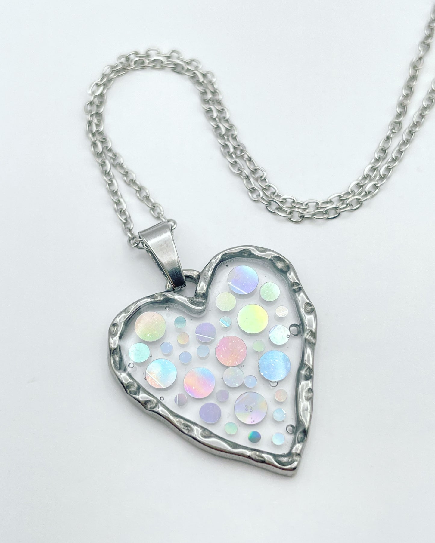 Disco heart necklace with holographic silver sparkles