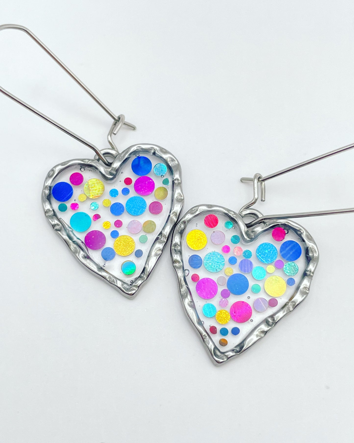 Disco heart earrings with colourful sparkles