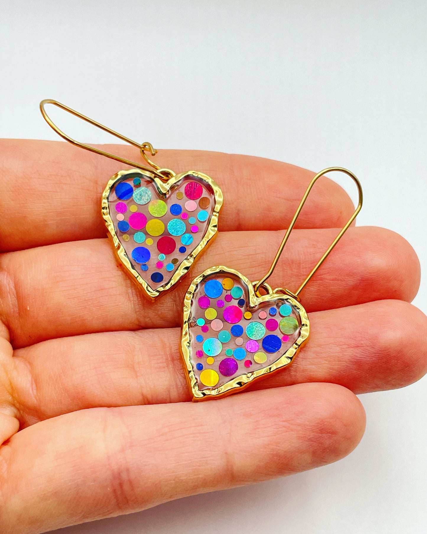 Disco heart earrings with colourful sparkles