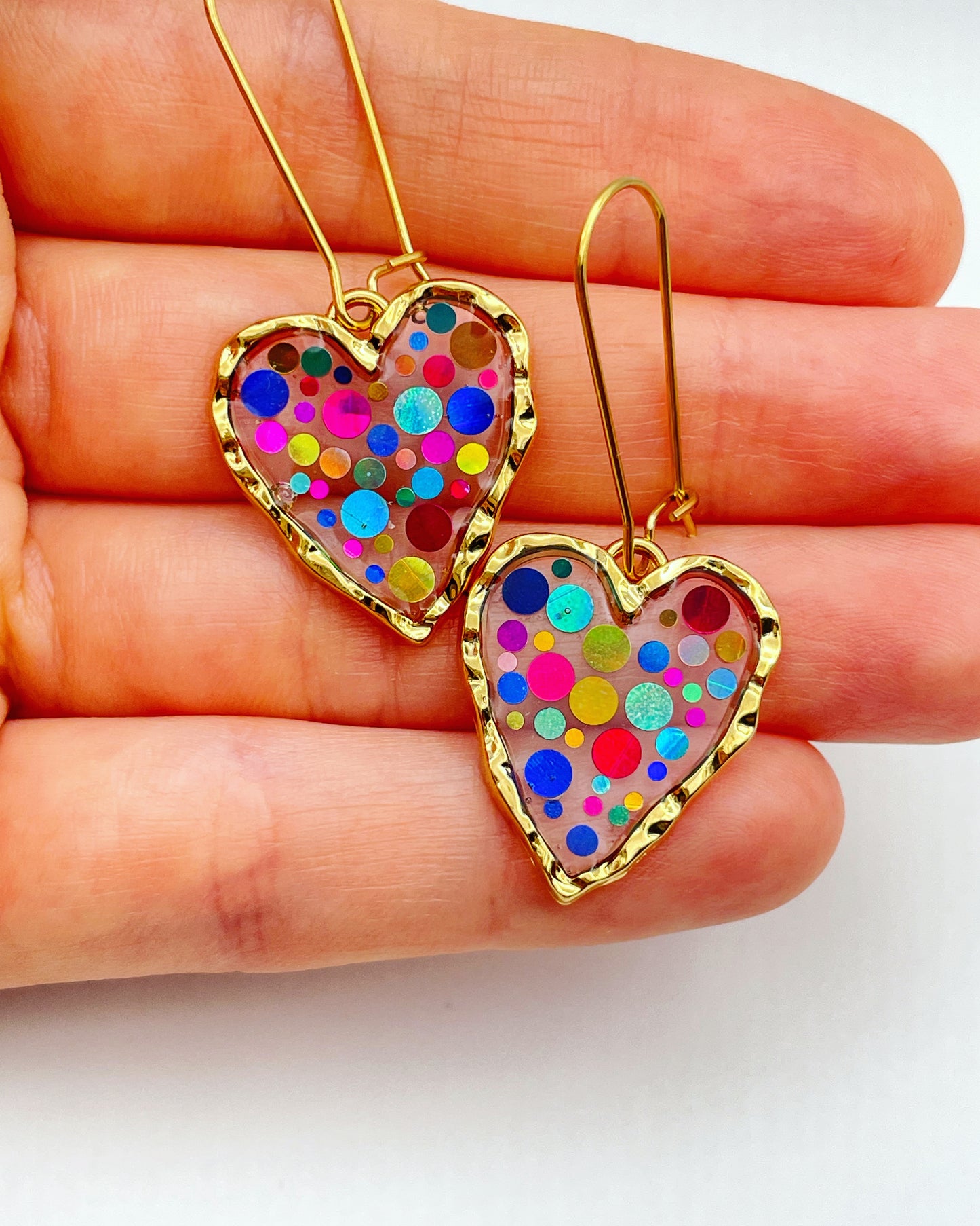 Disco heart earrings with colourful sparkles