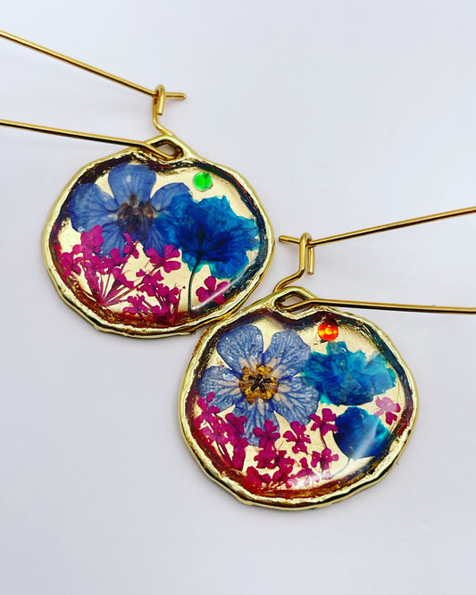 Gold dangle earrings with pink and blue flowers