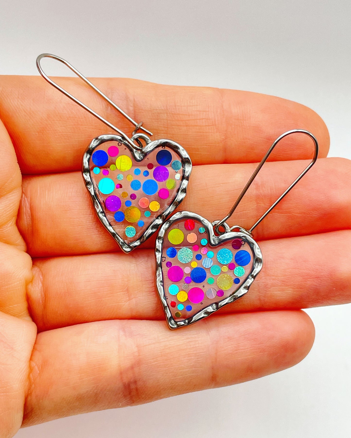 Disco heart earrings with colourful sparkles