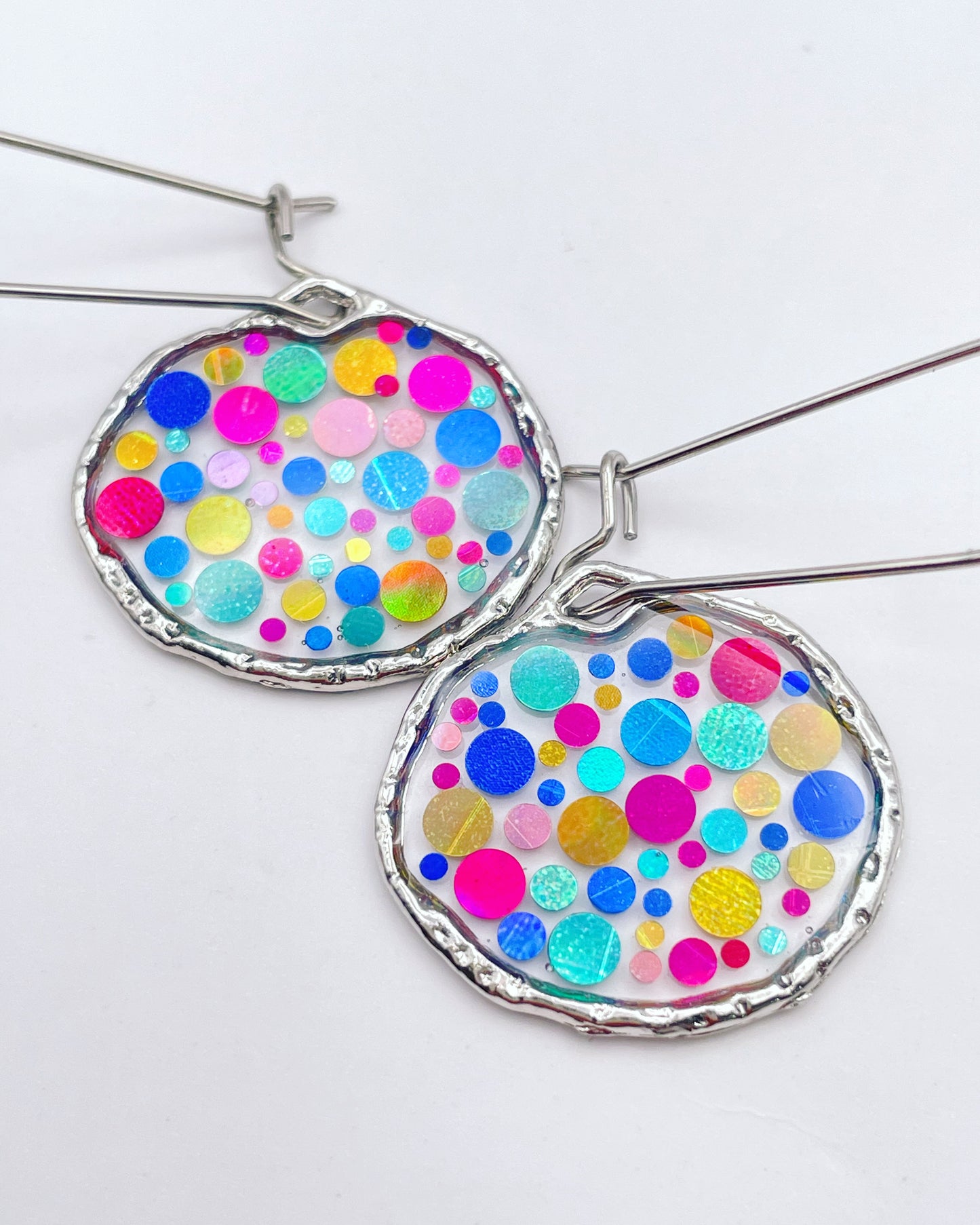 Small disco earrings with colourful sparkles