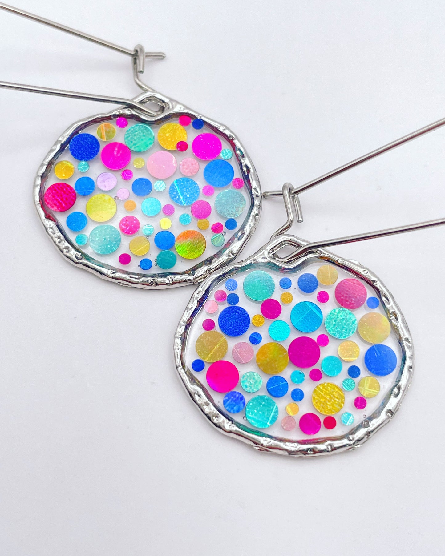 Small disco earrings with colourful sparkles