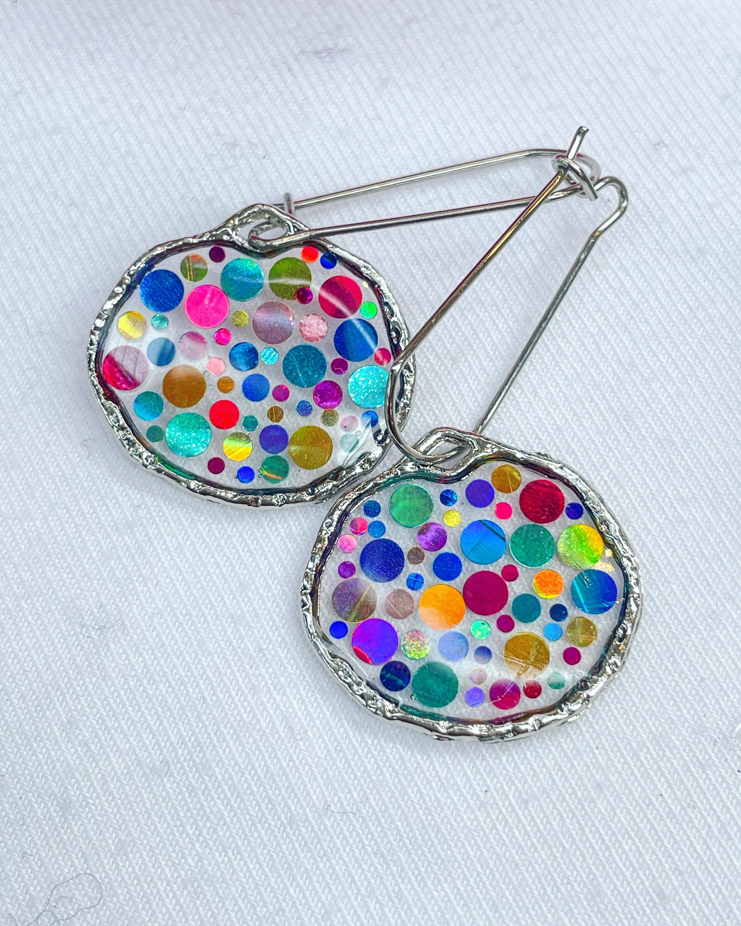 Small disco earrings with colourful sparkles