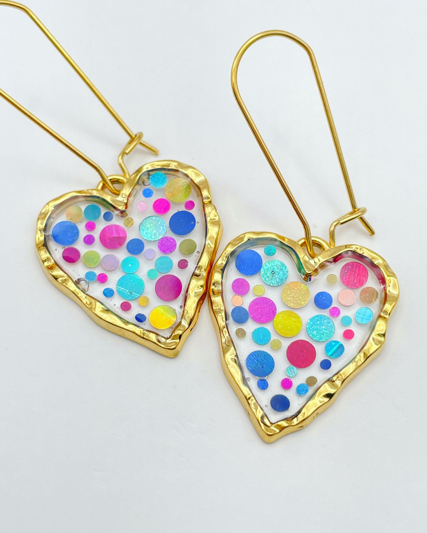Disco heart earrings with colourful sparkles