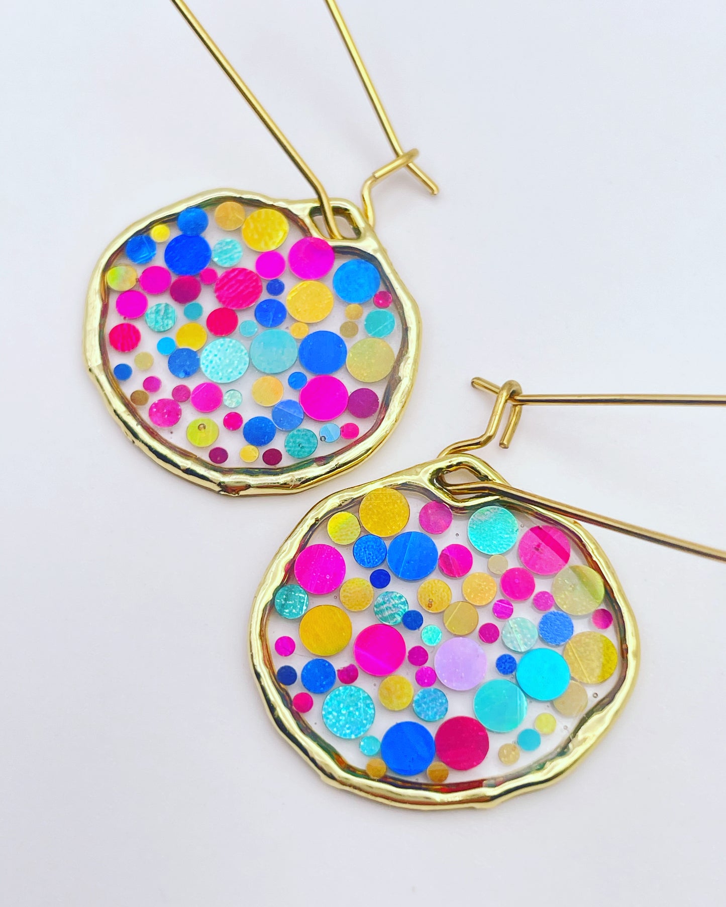 Small disco earrings with colourful sparkles