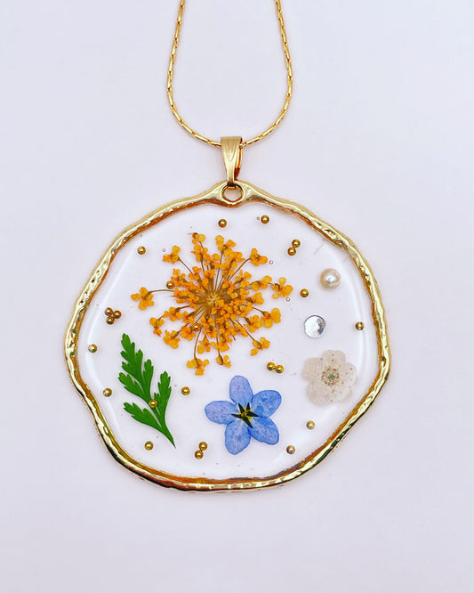 Statement necklace with forget-me-not and orange flowers