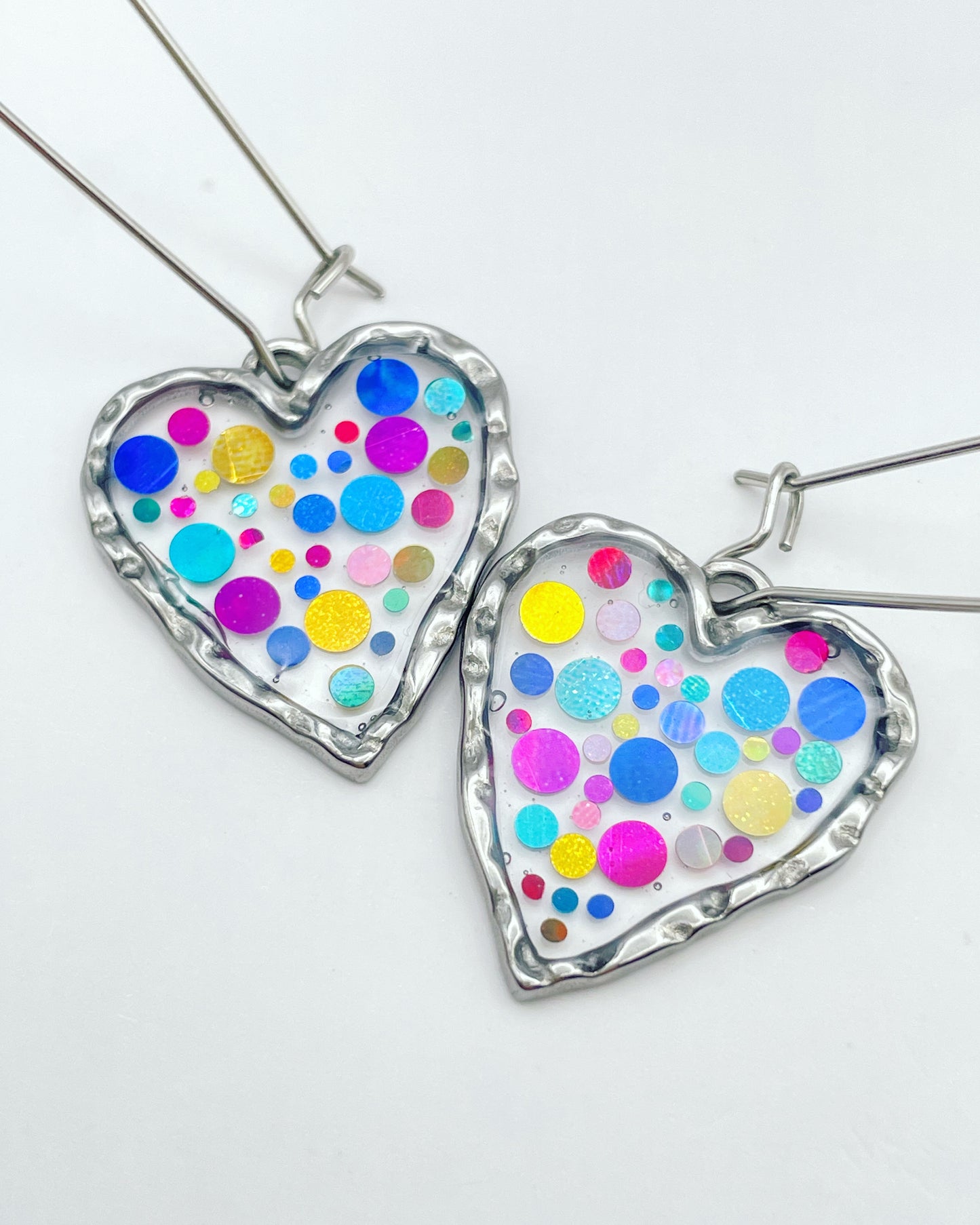 Disco heart earrings with colourful sparkles
