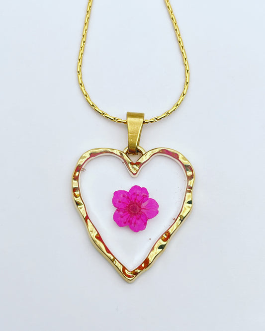 Heart necklace with bright pink flowers