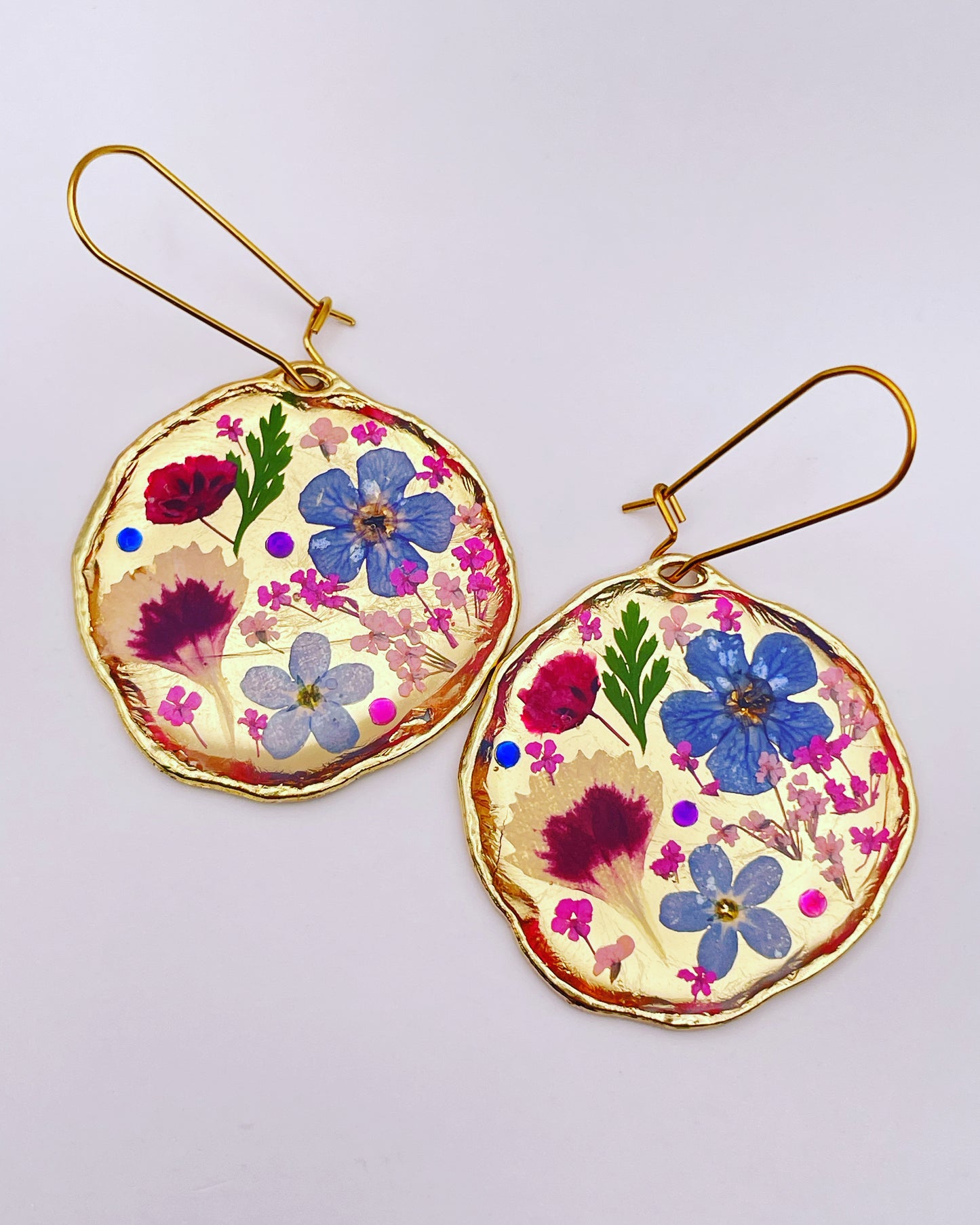 Statement earrings with real flowers and gold leaf