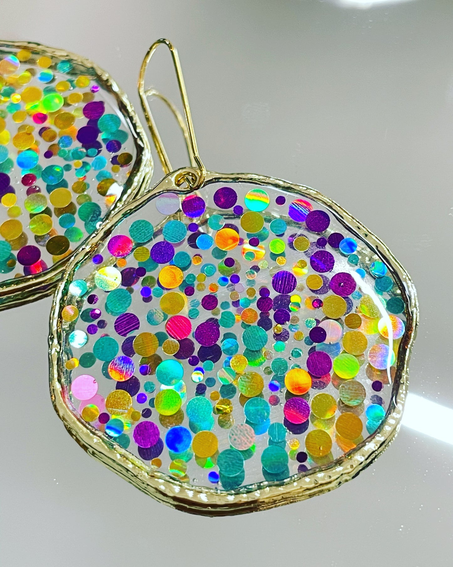 Large disco earrings with colourful sparkles