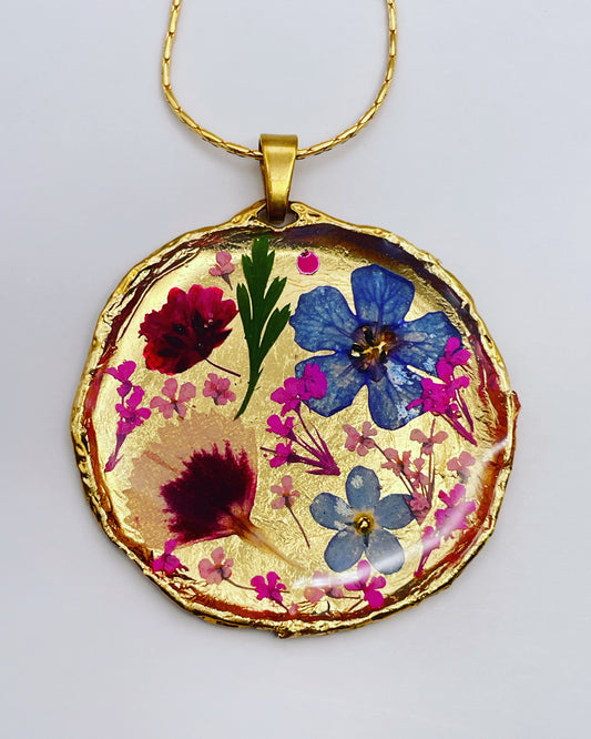 Statement necklace with real flowers and gold leaf
