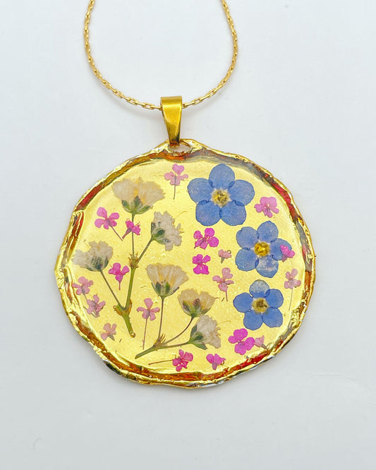 Gold necklace with forget-me-not and gypsophila