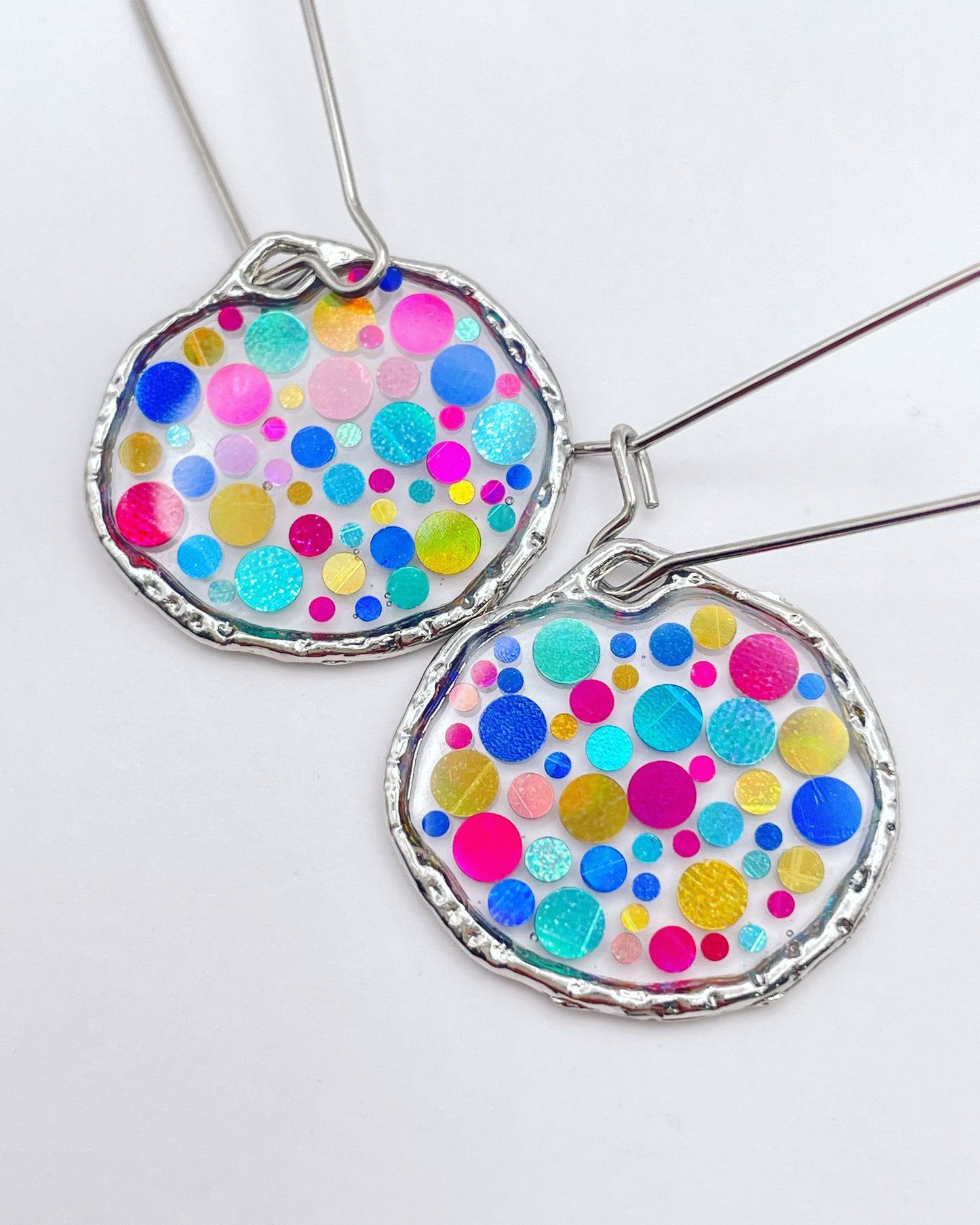 Small disco earrings with colourful sparkles