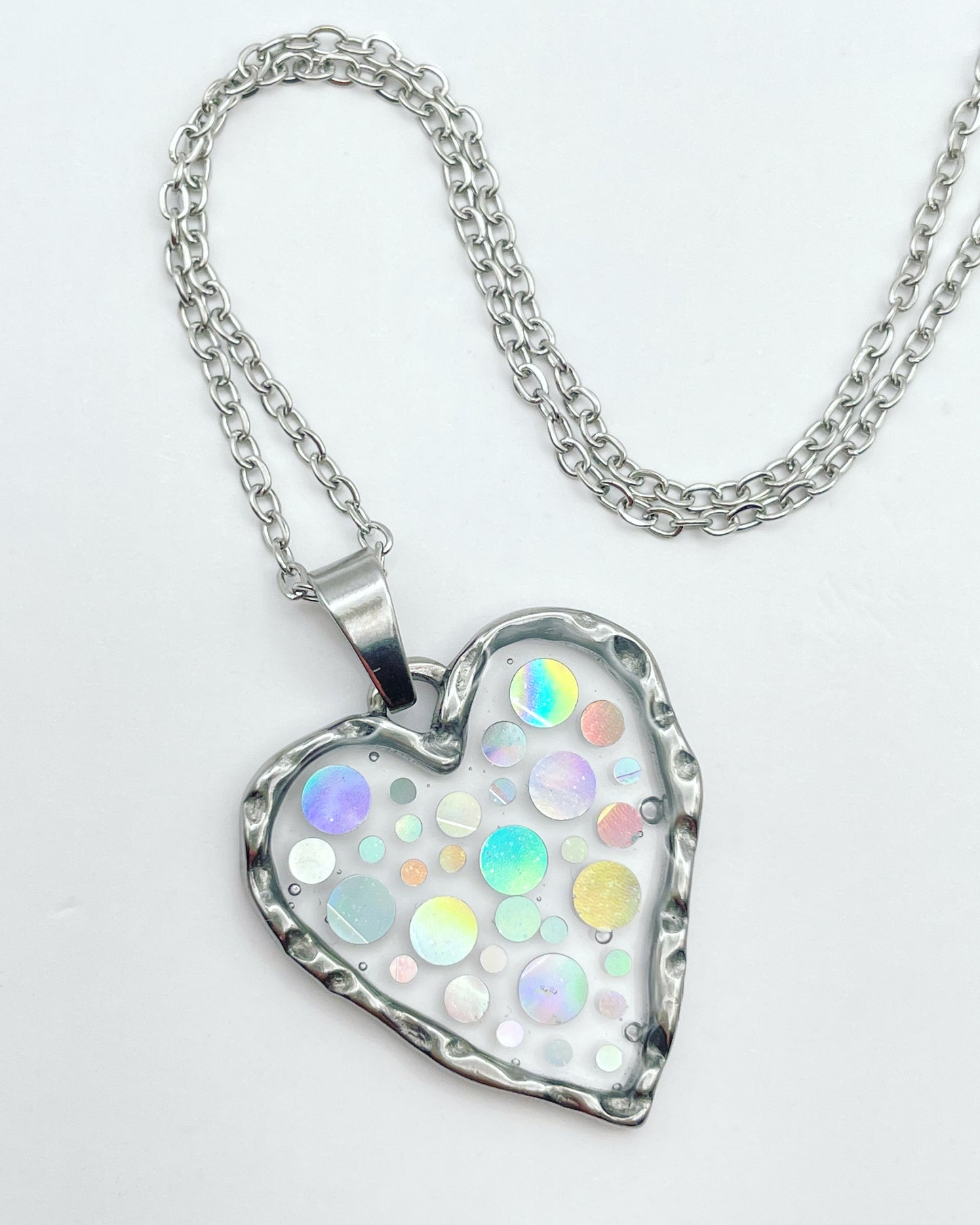 Disco heart necklace with holographic silver sparkles