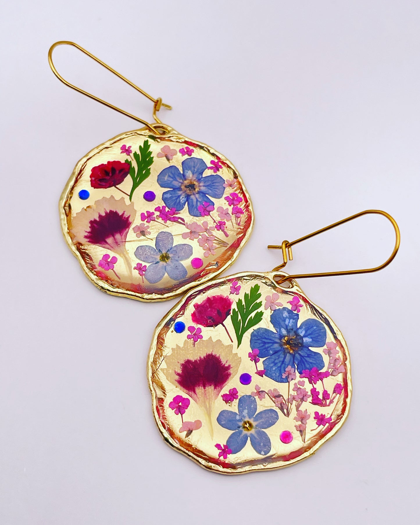 Statement earrings with real flowers and gold leaf