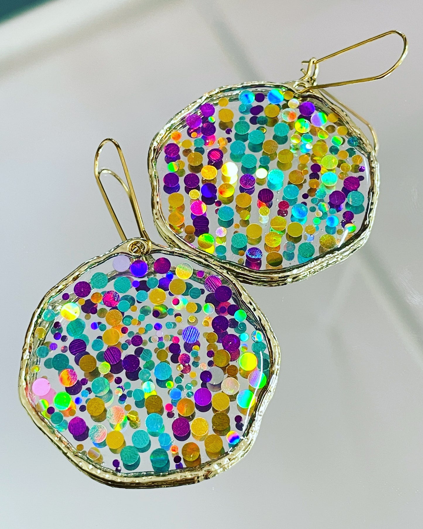 Large disco earrings with colourful sparkles
