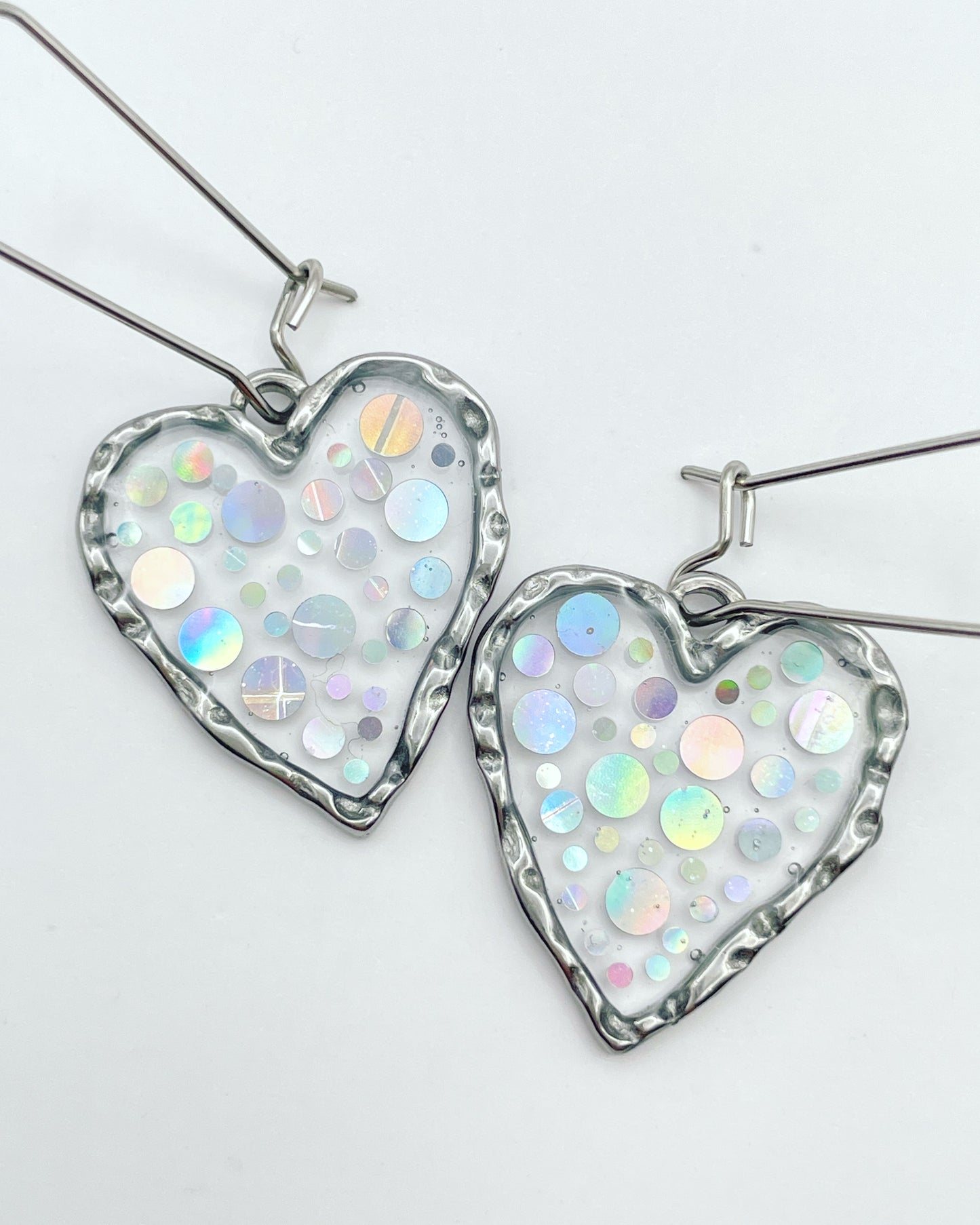 Disco heart earrings with  holographic silver sparkles
