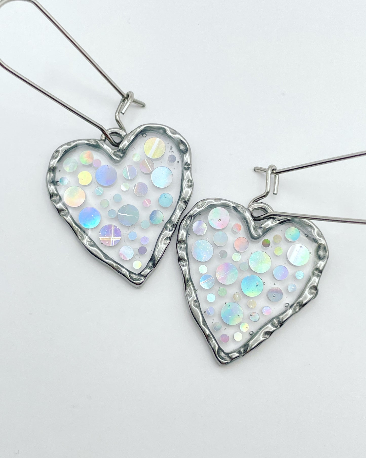 Disco heart earrings with  holographic silver sparkles