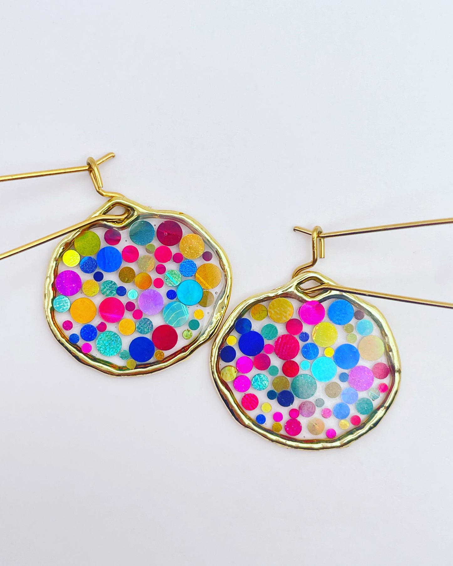 Small disco earrings with colourful sparkles