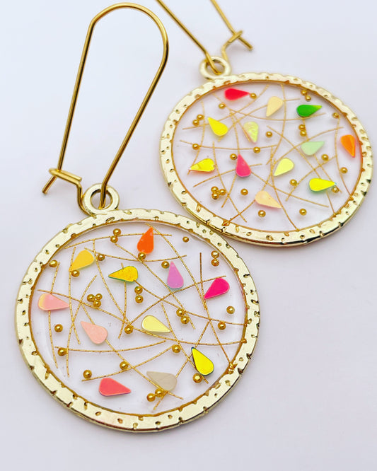 Elegant disco earrings with gold sparkles