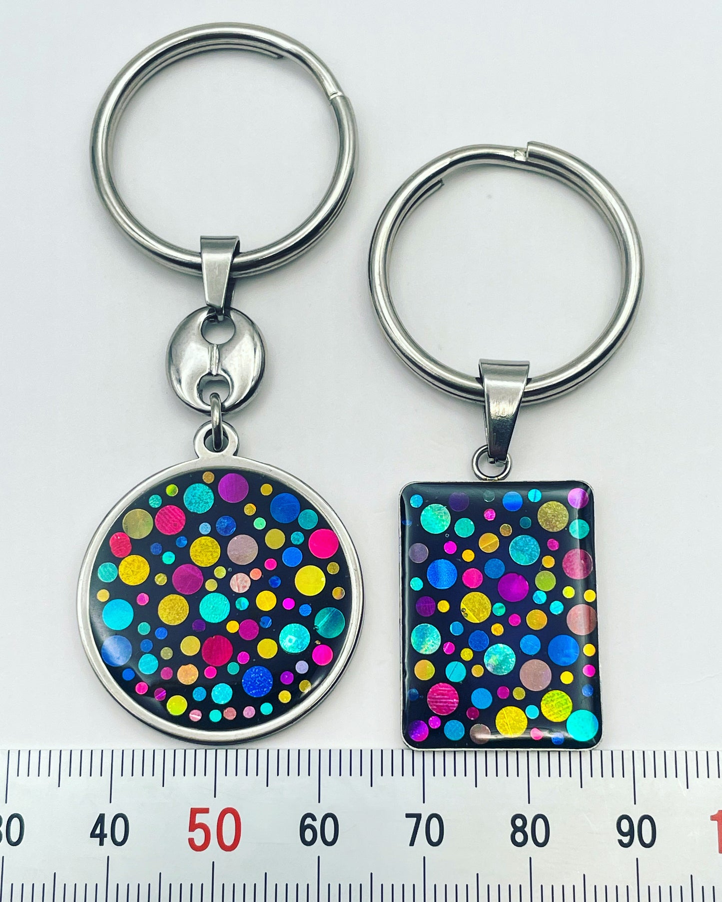 Disco keyrings with colourful sparkles circle or rectangle