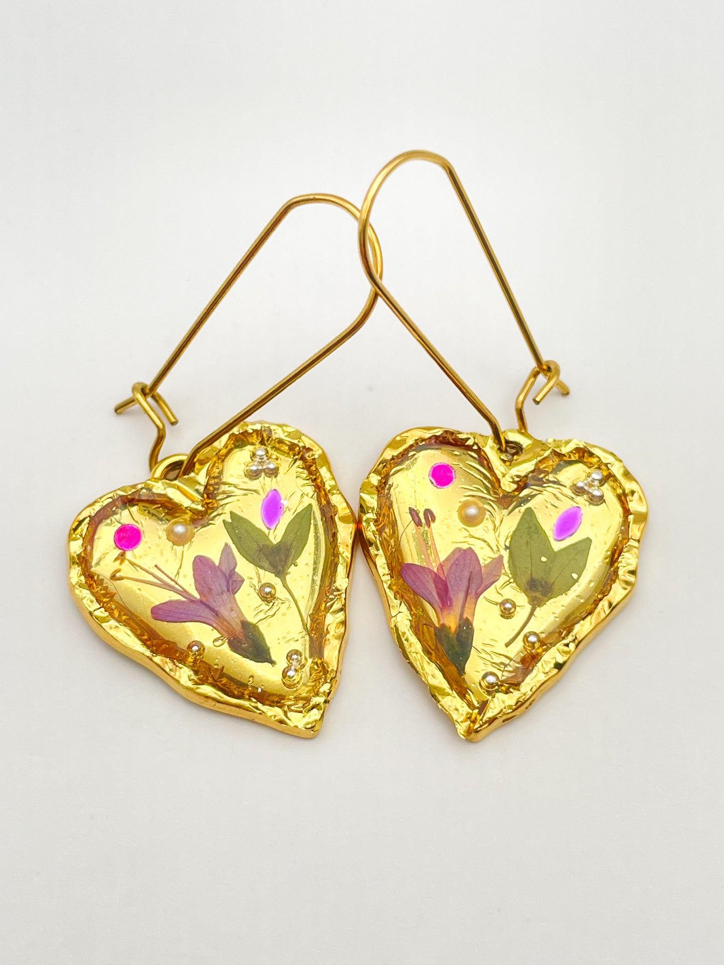 Gold heart earrings with pink flowers