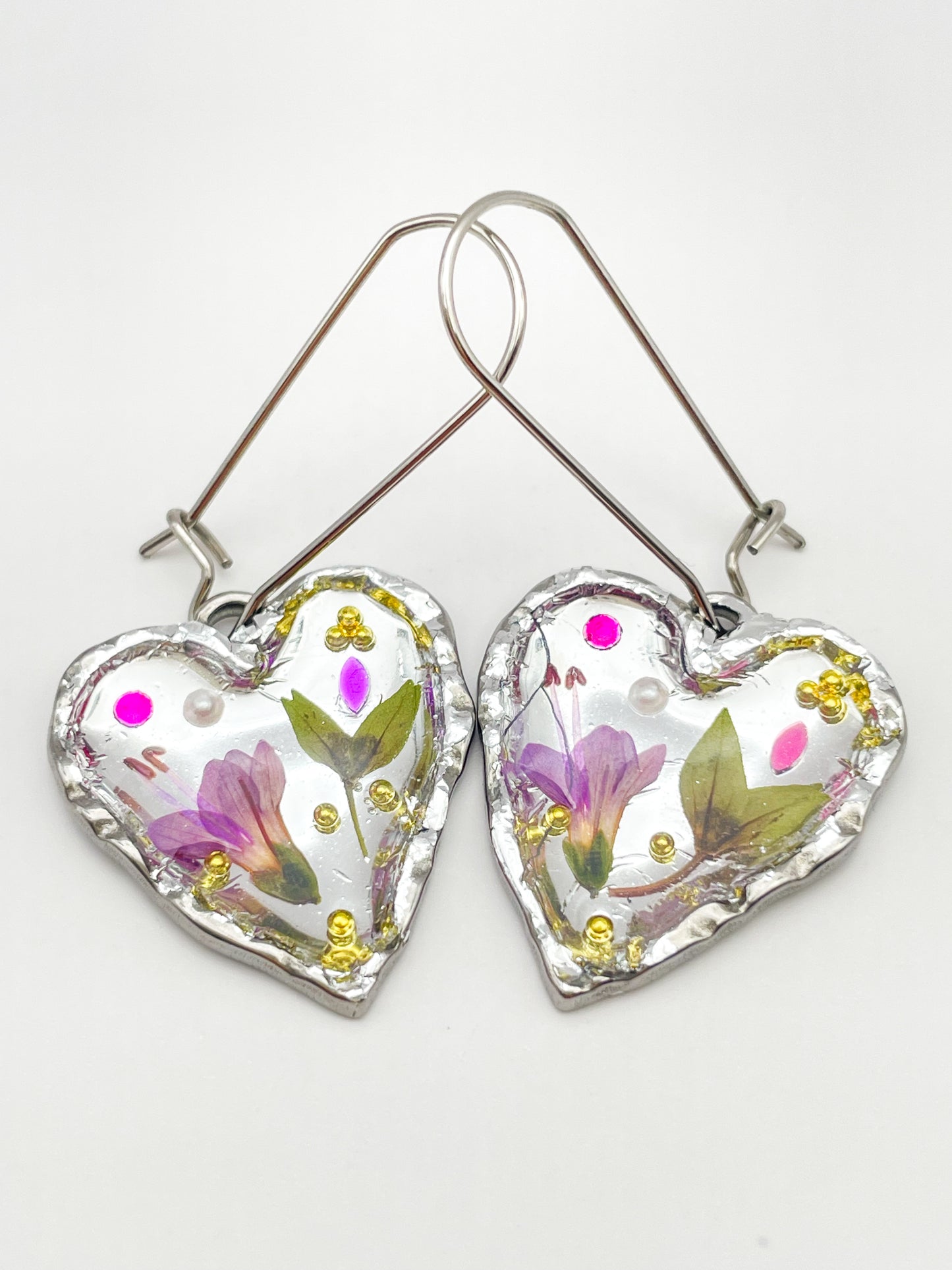 Silver heart earrings with pink flowers