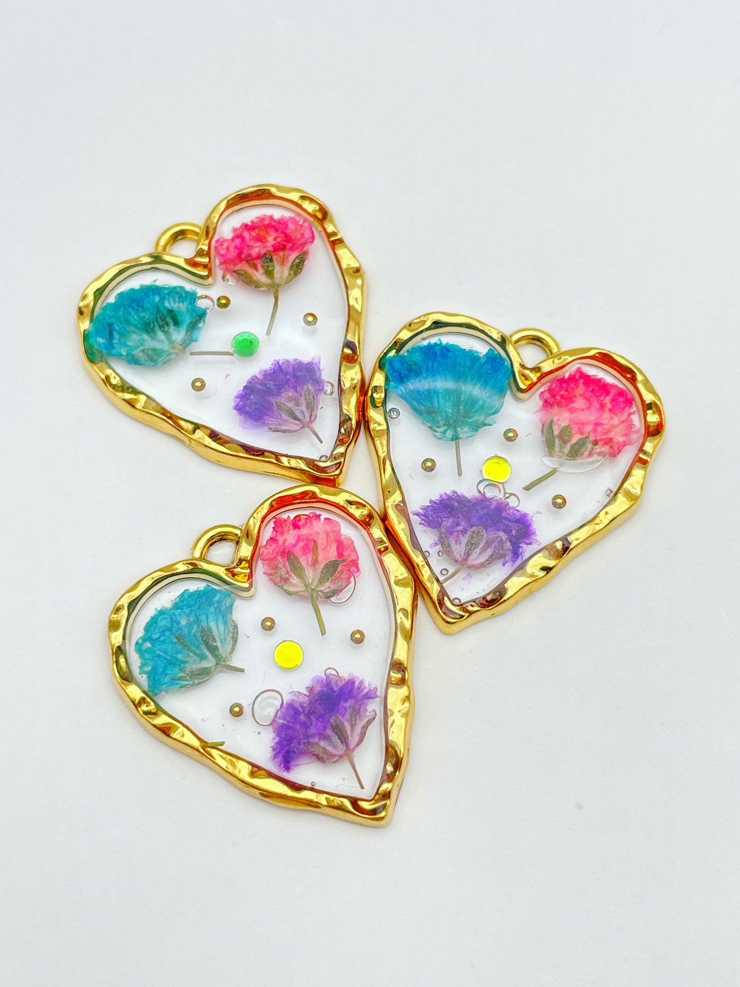 Heart earrings with colourful gypsophila flowers
