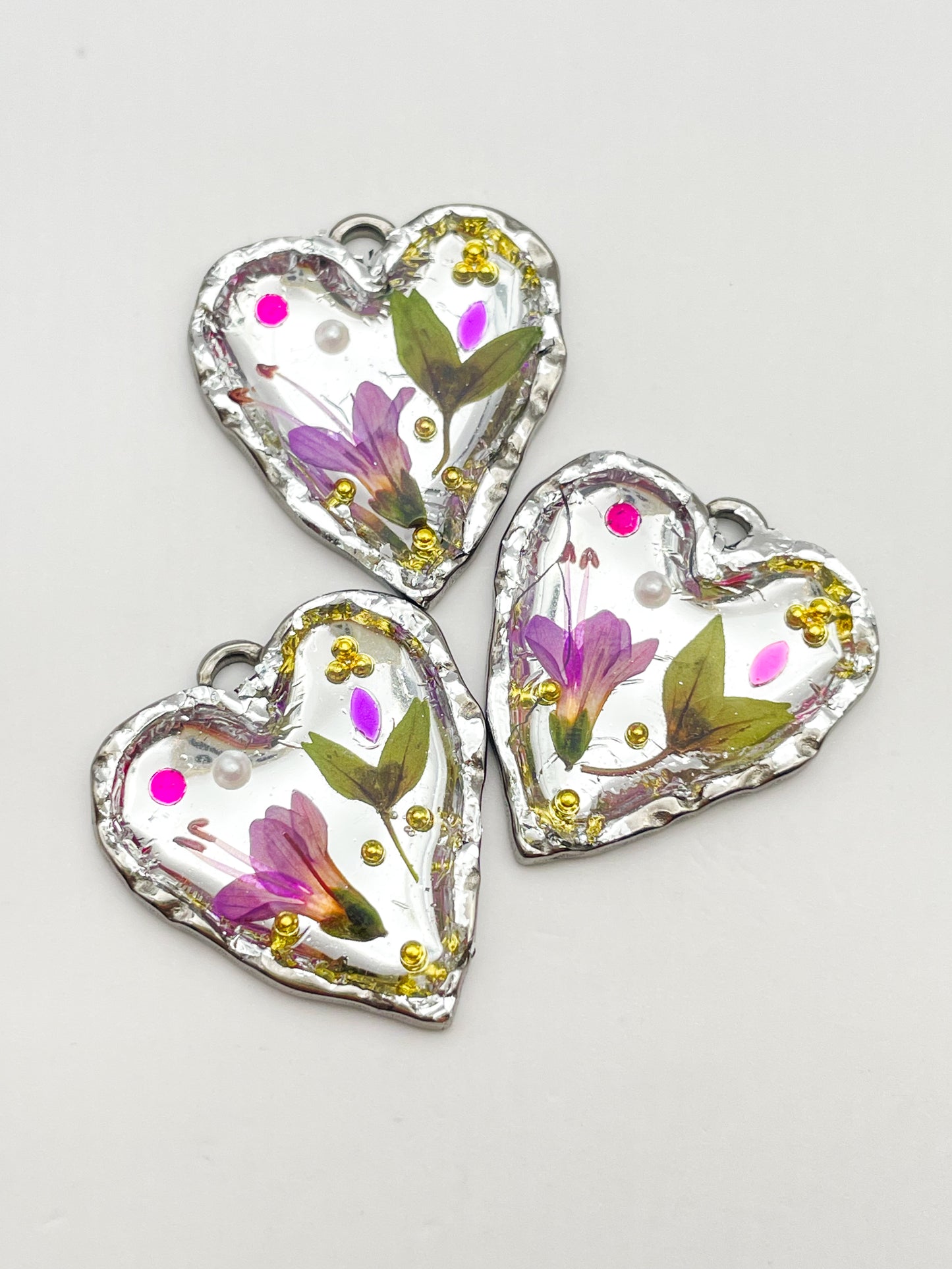 Silver heart earrings with pink flowers