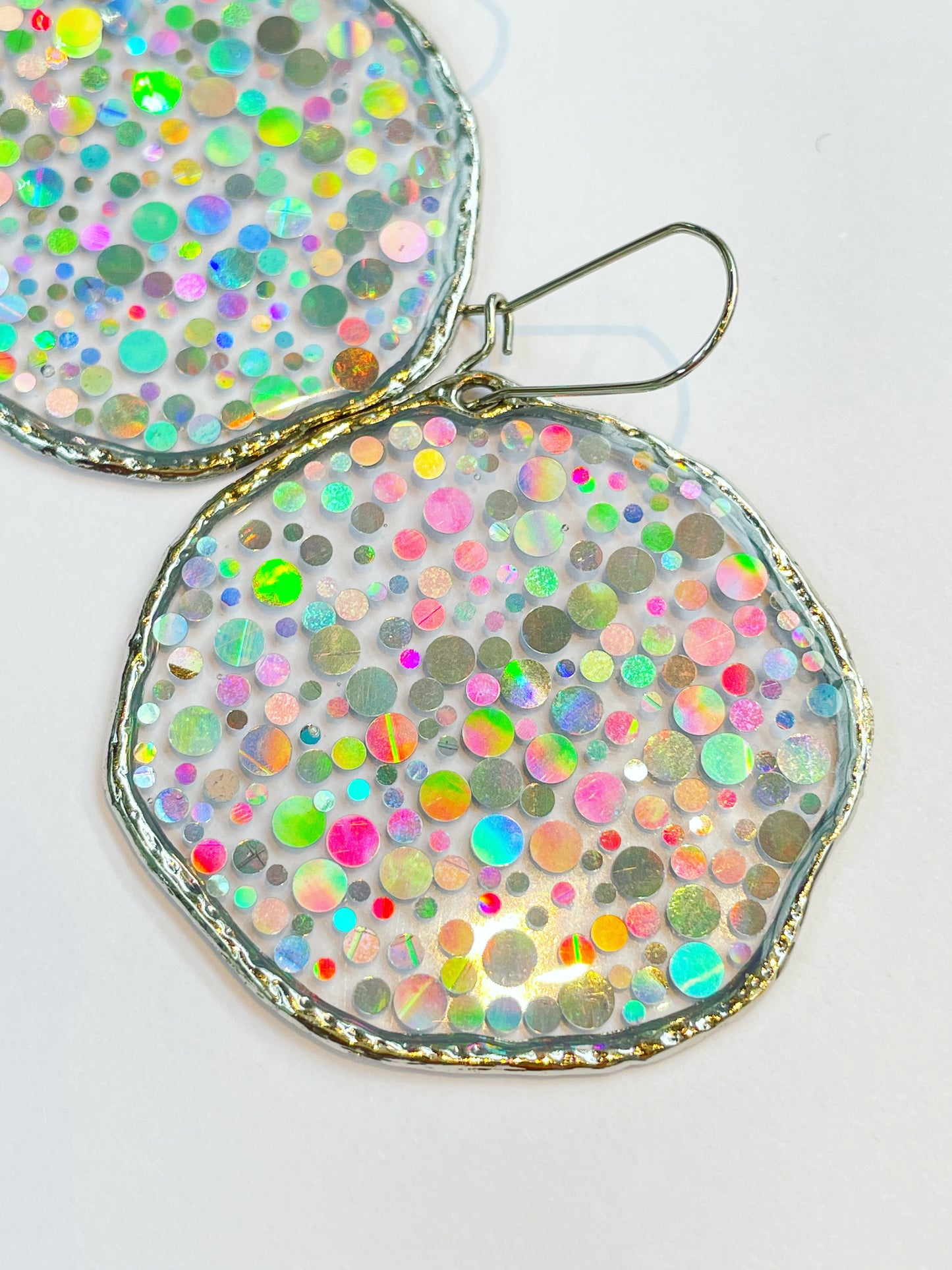 Large disco earrings with holographic silver sparkles