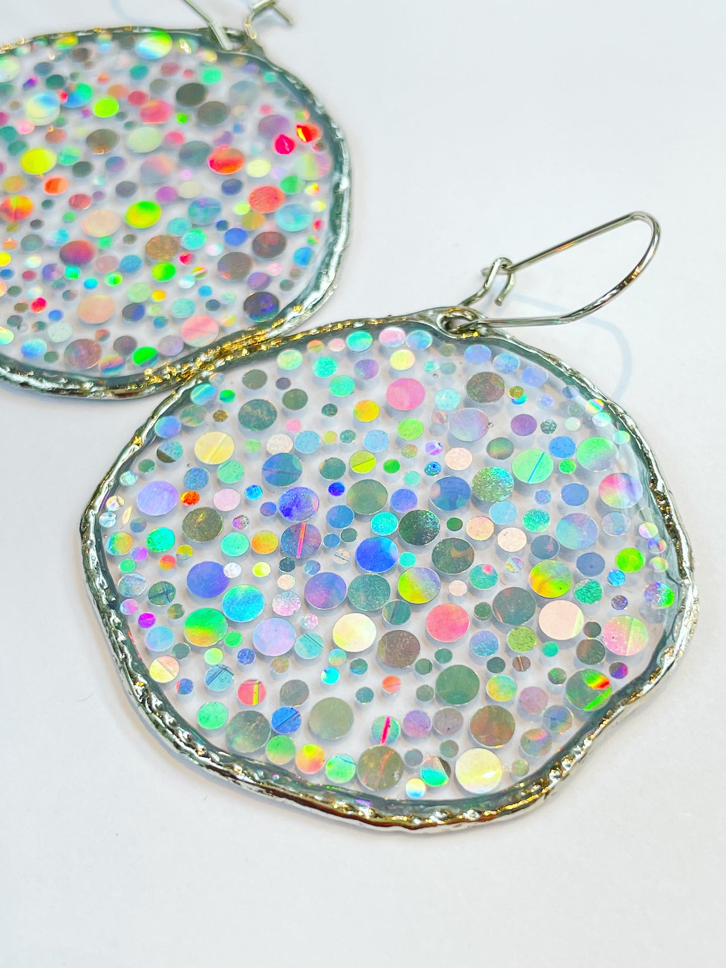 Large disco earrings with holographic silver sparkles