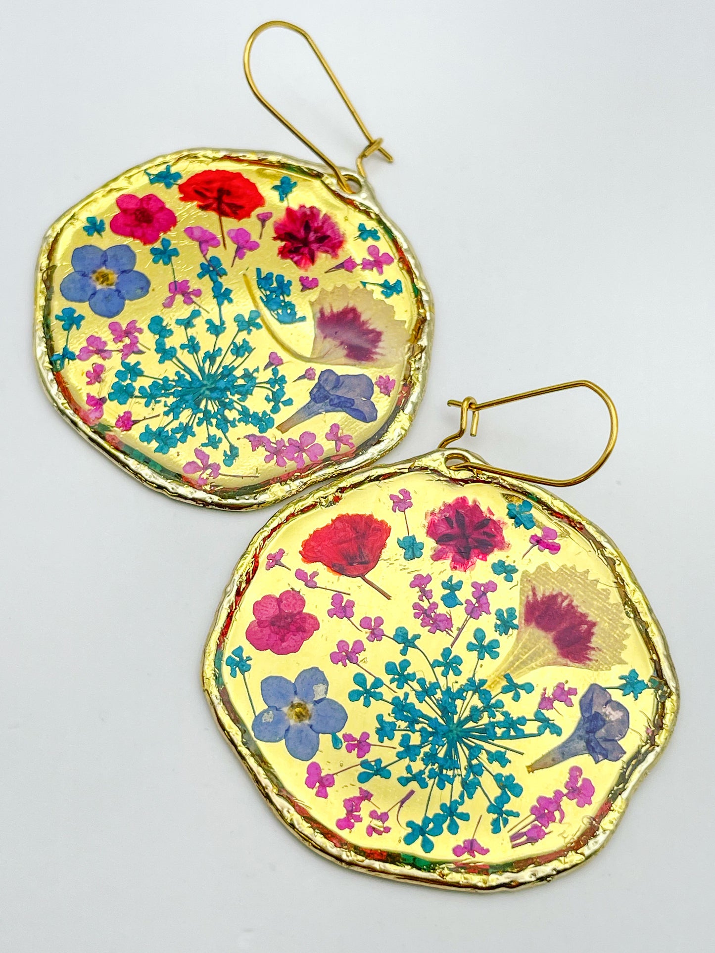 Large dangle earrings with real flowers and gold leaf
