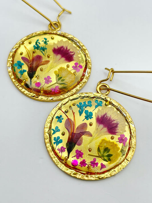 Gold dangle earrings with real pink flowers and gold leaf