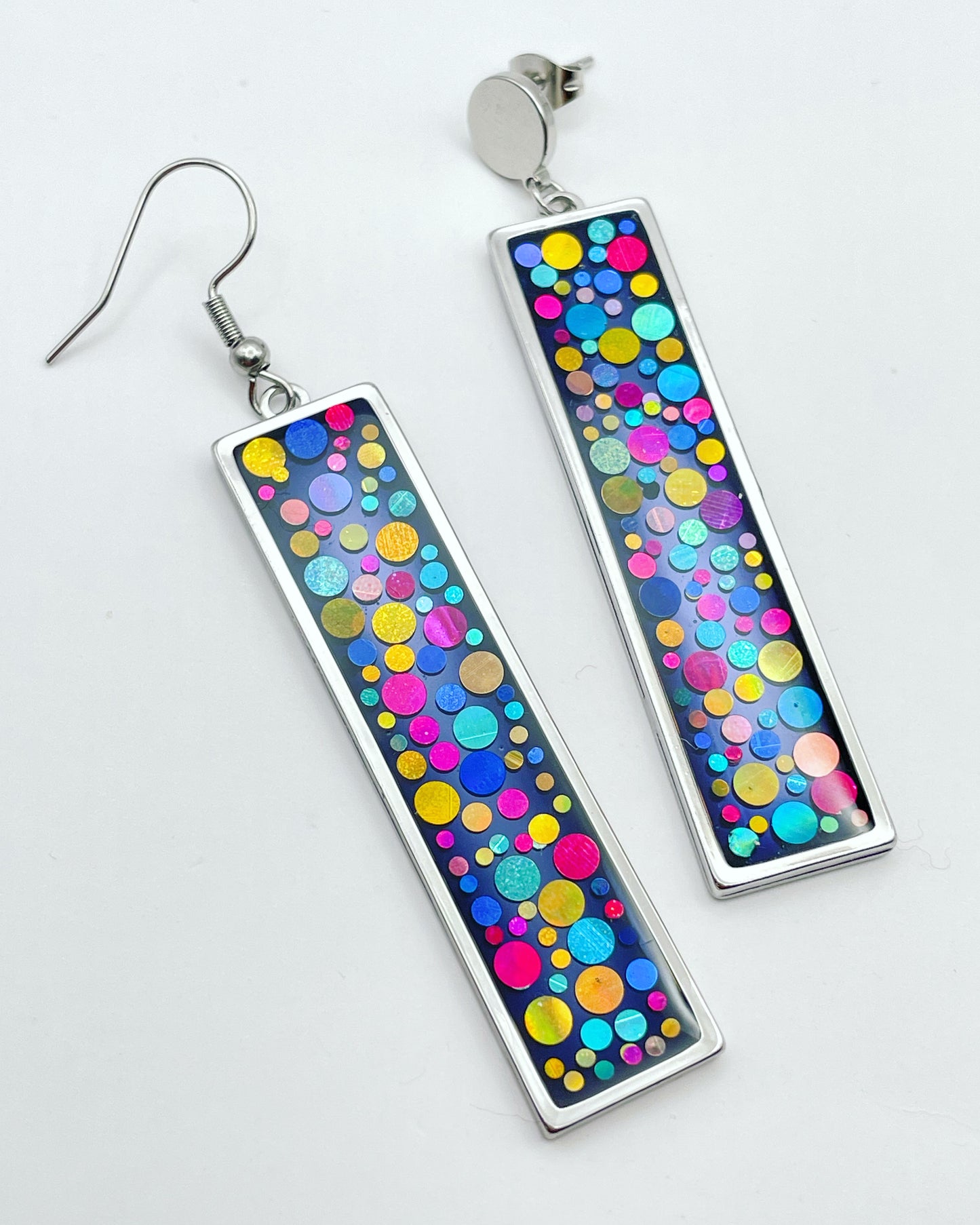 Long disco earrings with colourful sparkles in black lacquer