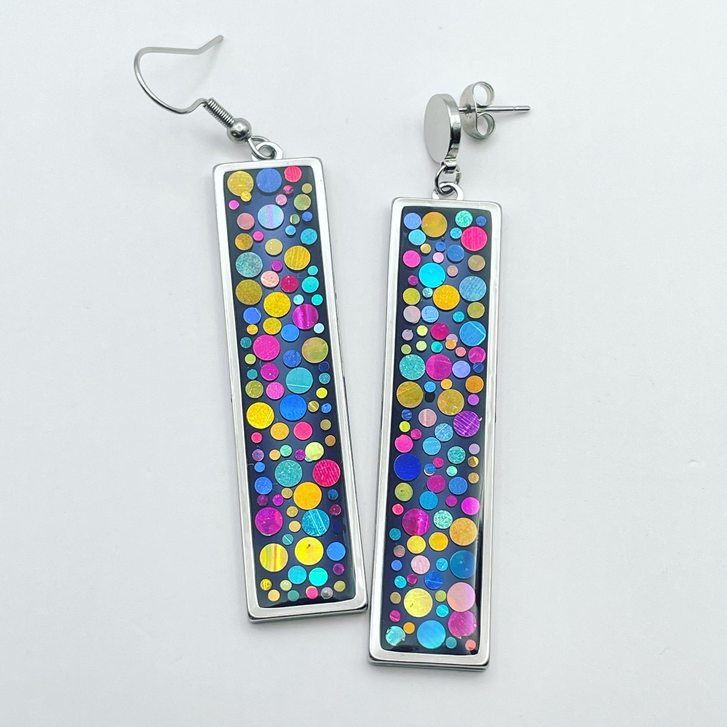 Long disco earrings with colourful sparkles in black lacquer