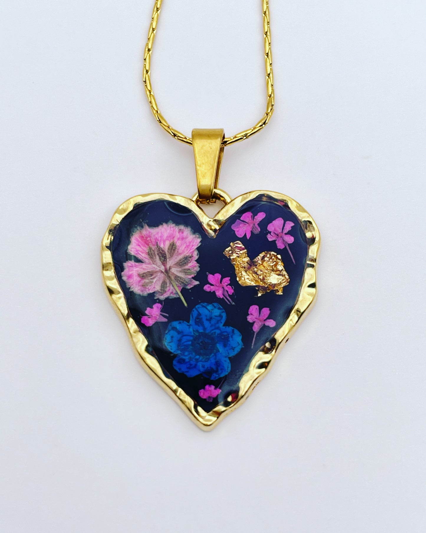 Black heart pendant necklace with real flowers and gold leaf