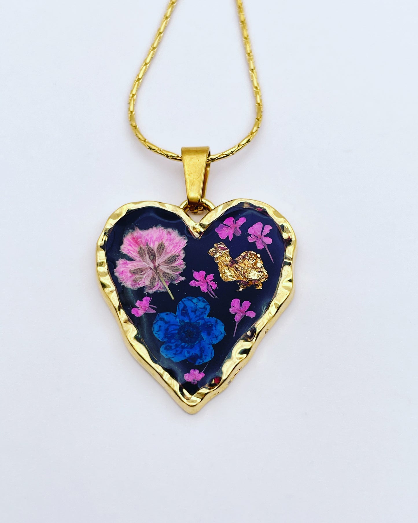 Black heart pendant necklace with real flowers and gold leaf