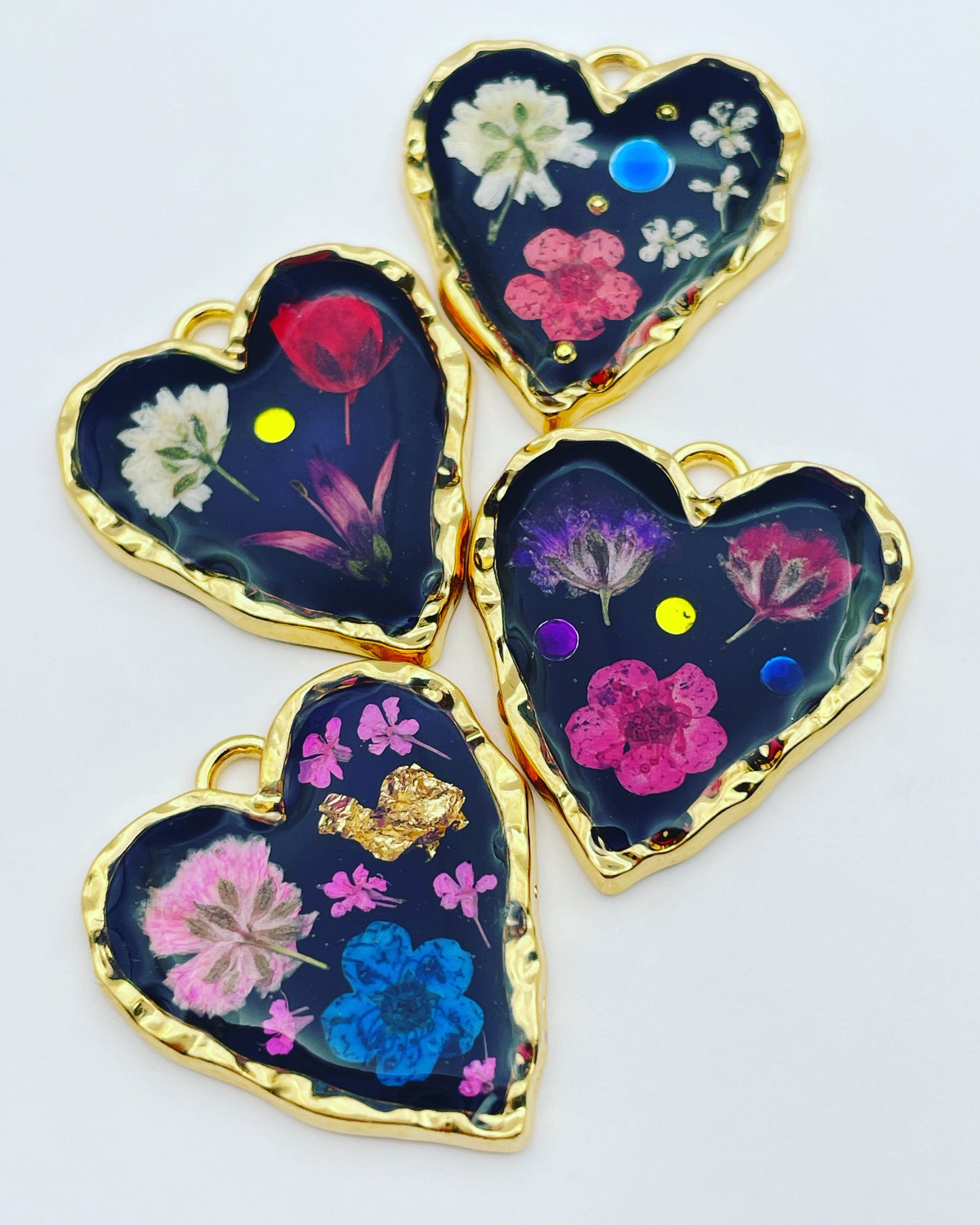 Black heart pendant necklace with real flowers and gold leaf
