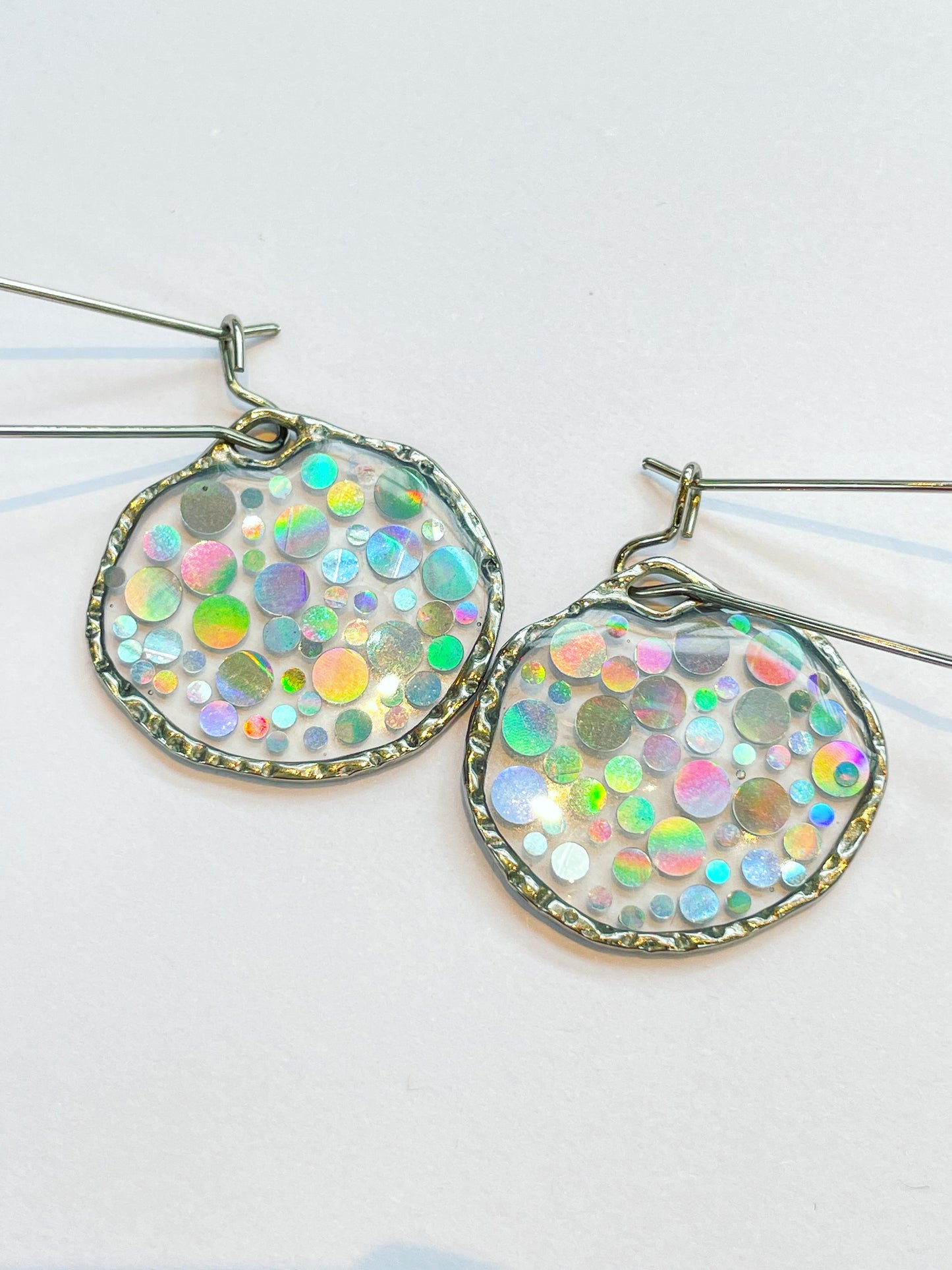 Small disco earrings with holographic silver sparkles