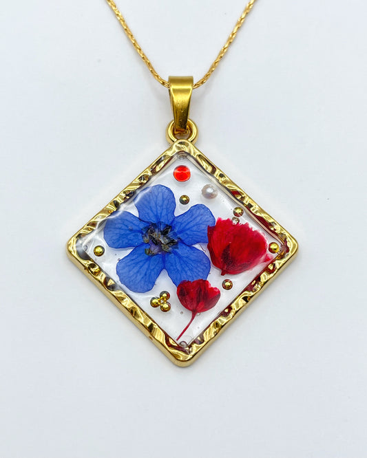 Square pendant necklace with red poppies and blue flowers