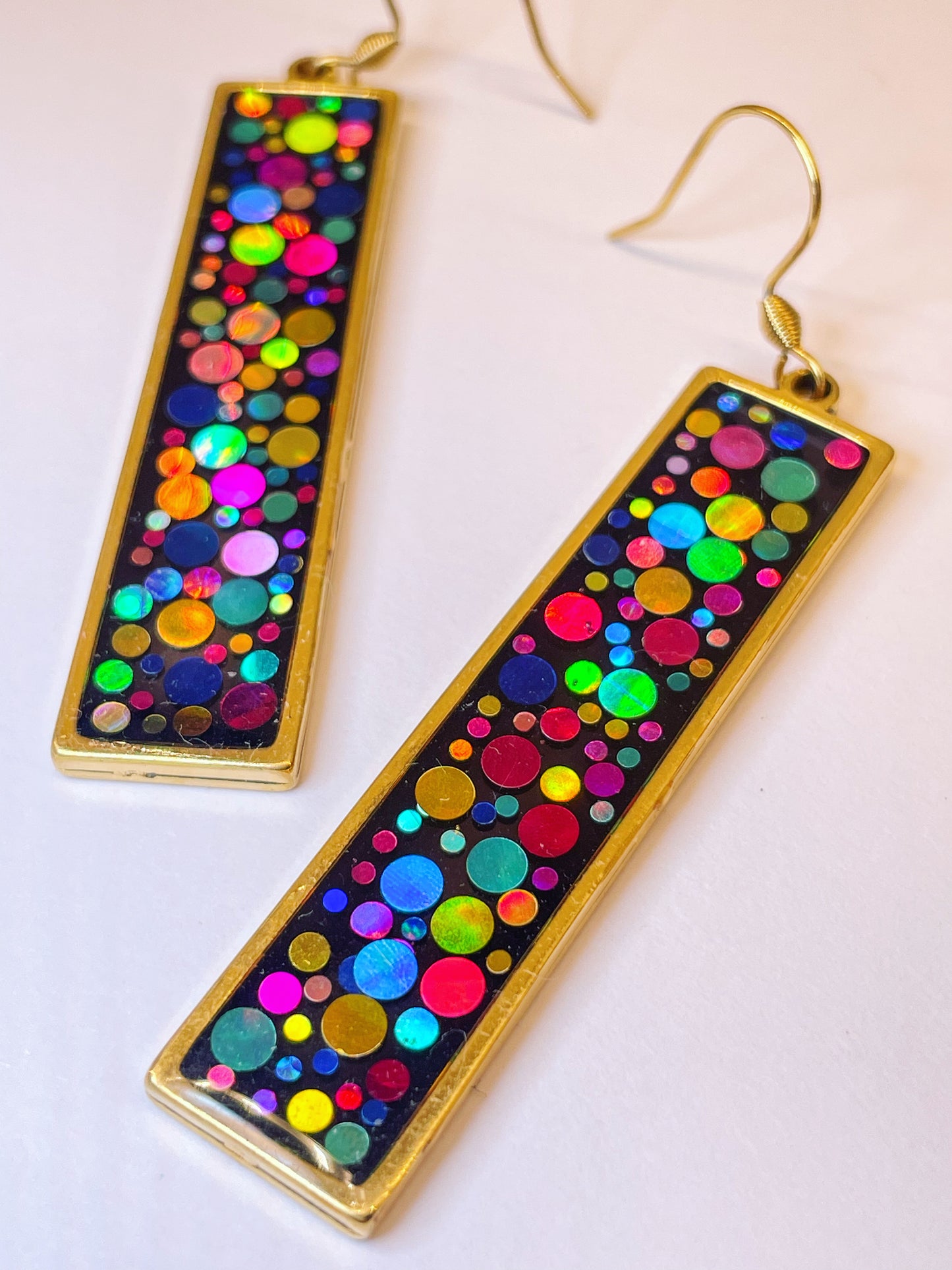 Long disco earrings with colourful sparkles in black lacquer