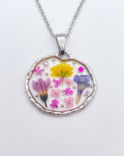 Pendant necklace with lavender and pink flowers