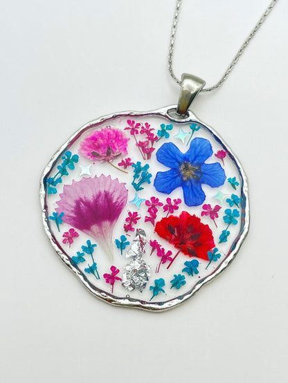 Statement earrings with colourful flowers in silver