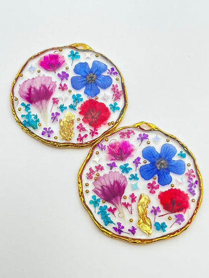 Statement earrings with colourful flowers in silver