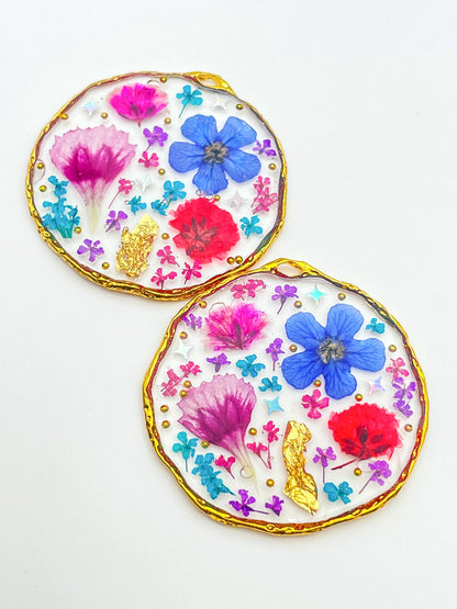 Statement earrings with colourful flowers in silver