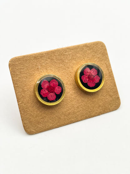 Stud earrings with red flowers in black lacquer