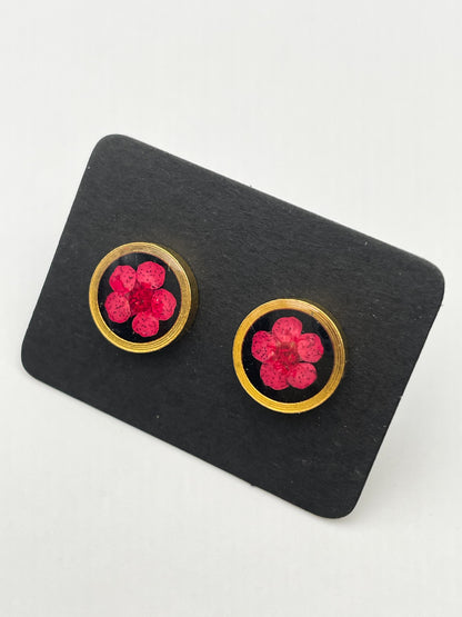 Stud earrings with red flowers in black lacquer