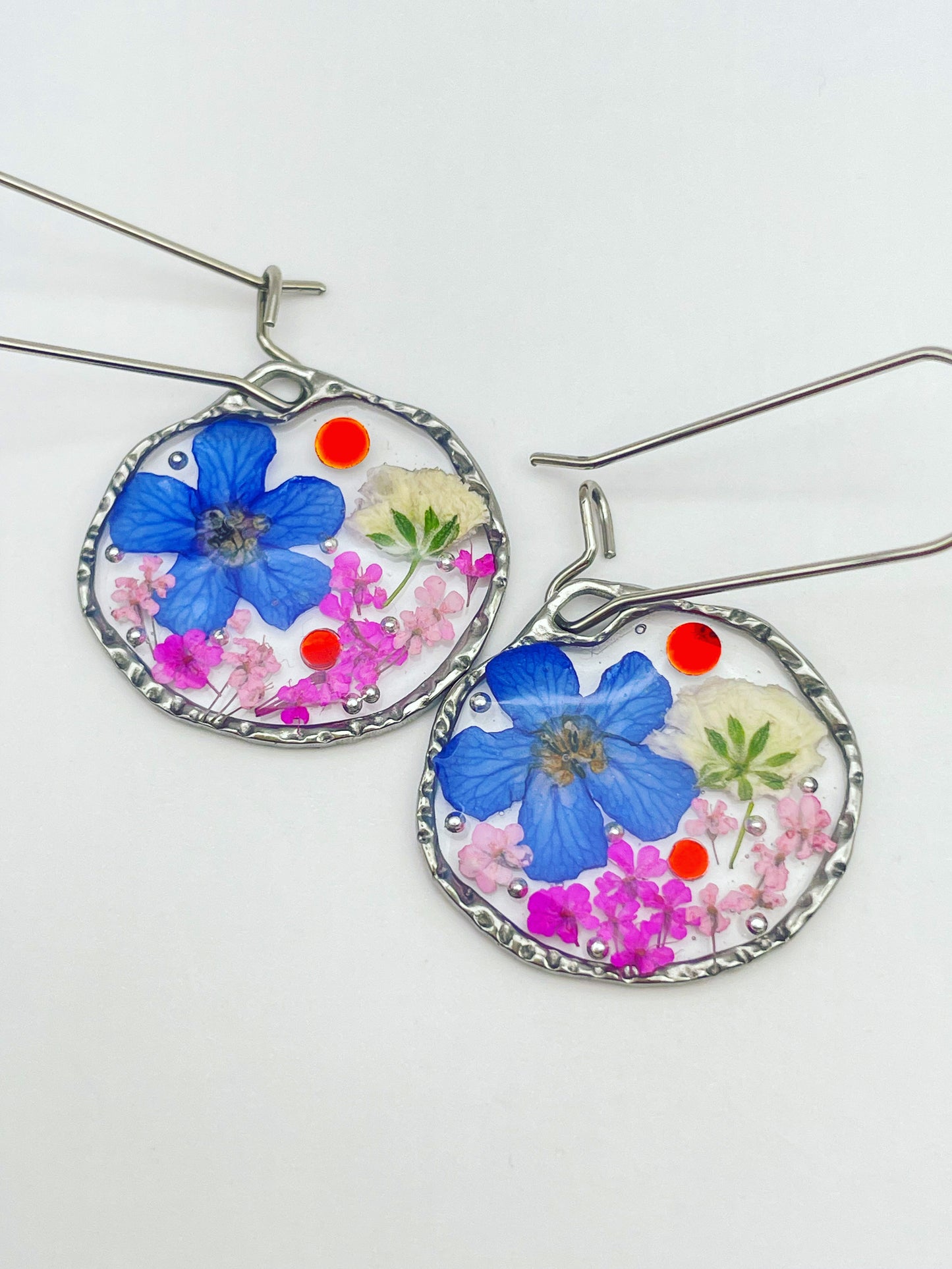 Dangle earrings with blue, white and pink gypsophila flowers